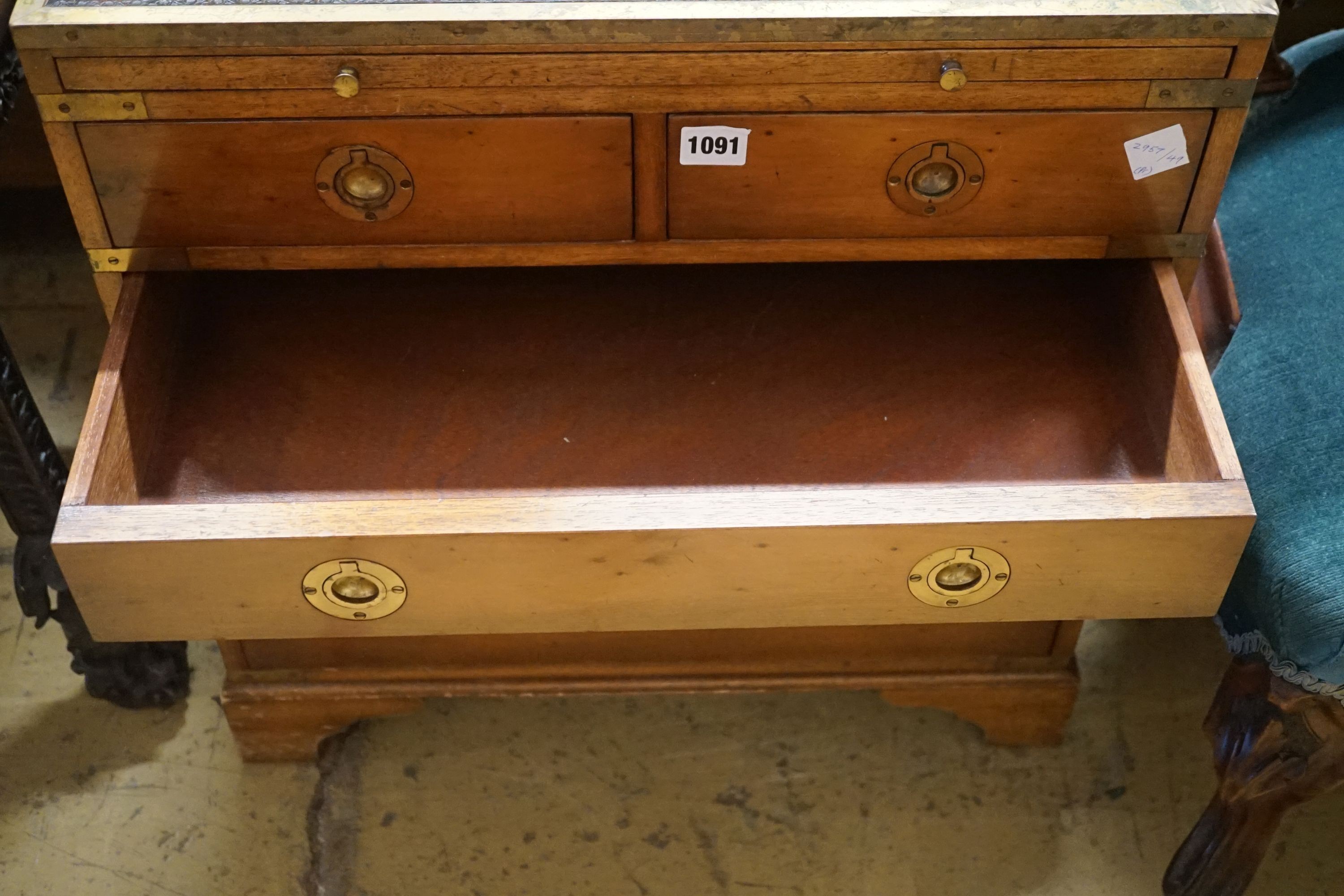 A pair of reproduction brass mounted military style yew veneered bedside chests with leather inset tops, width 56cm, depth 40cm, height 60cm